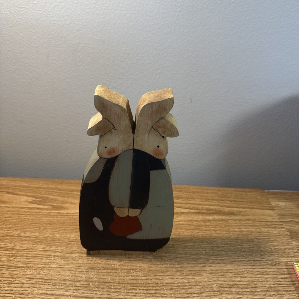 A set of folk art wooden bunny figurines. Spring Or Easter